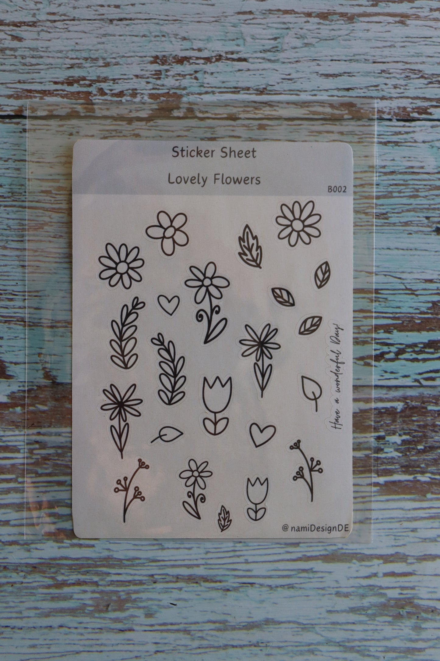 Stickerbogen mit handgezeichneten floralen Motiven – Blumen, Zweige, Tulpen und kleine Herzen in Schwarz-Weiß zum Selbstgestalten und Ausmalen